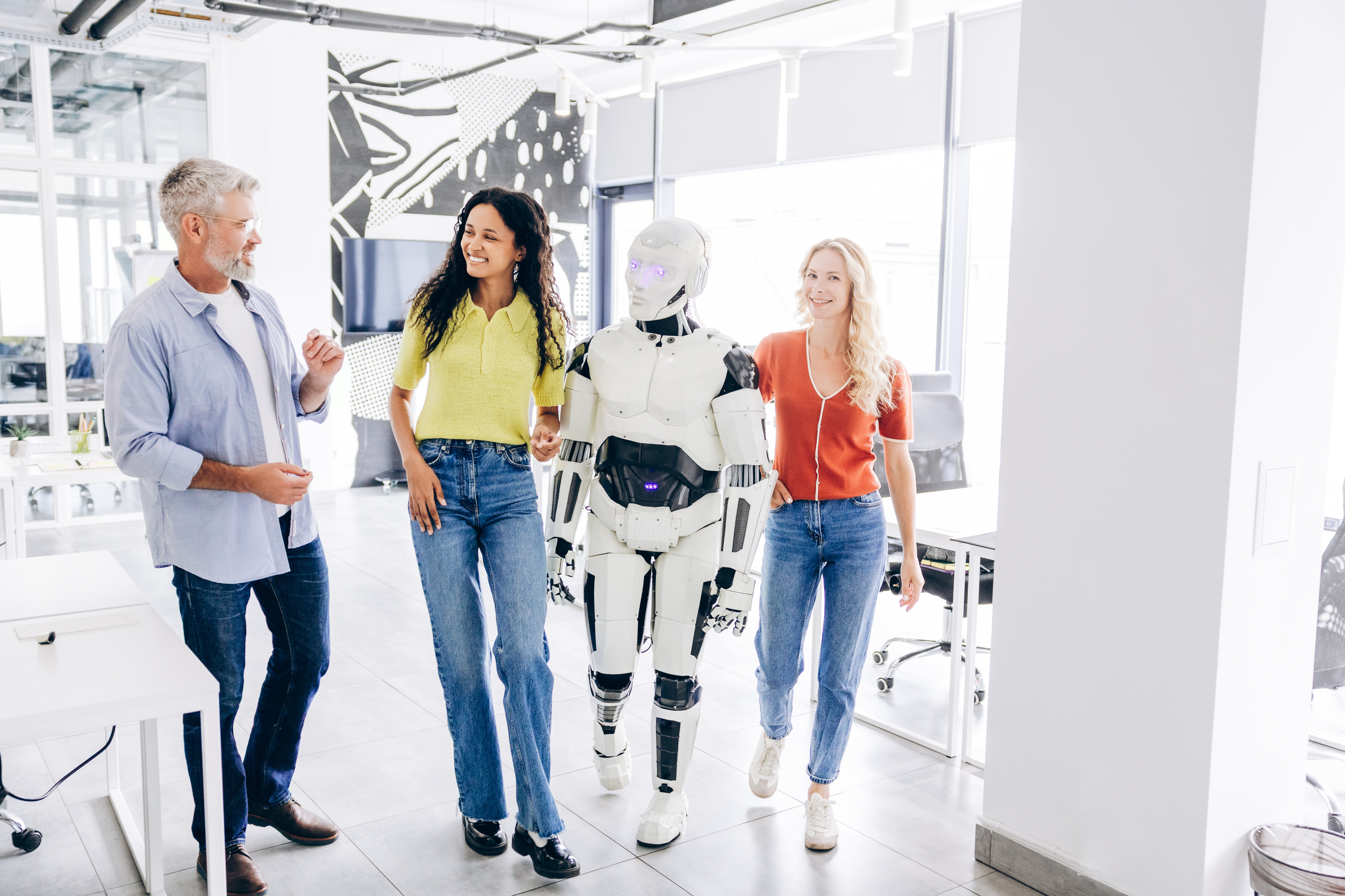 colleagues-walking-with-humanoid-robot-in-modern-b-2026-09-15-17-32-04-utc.jpg