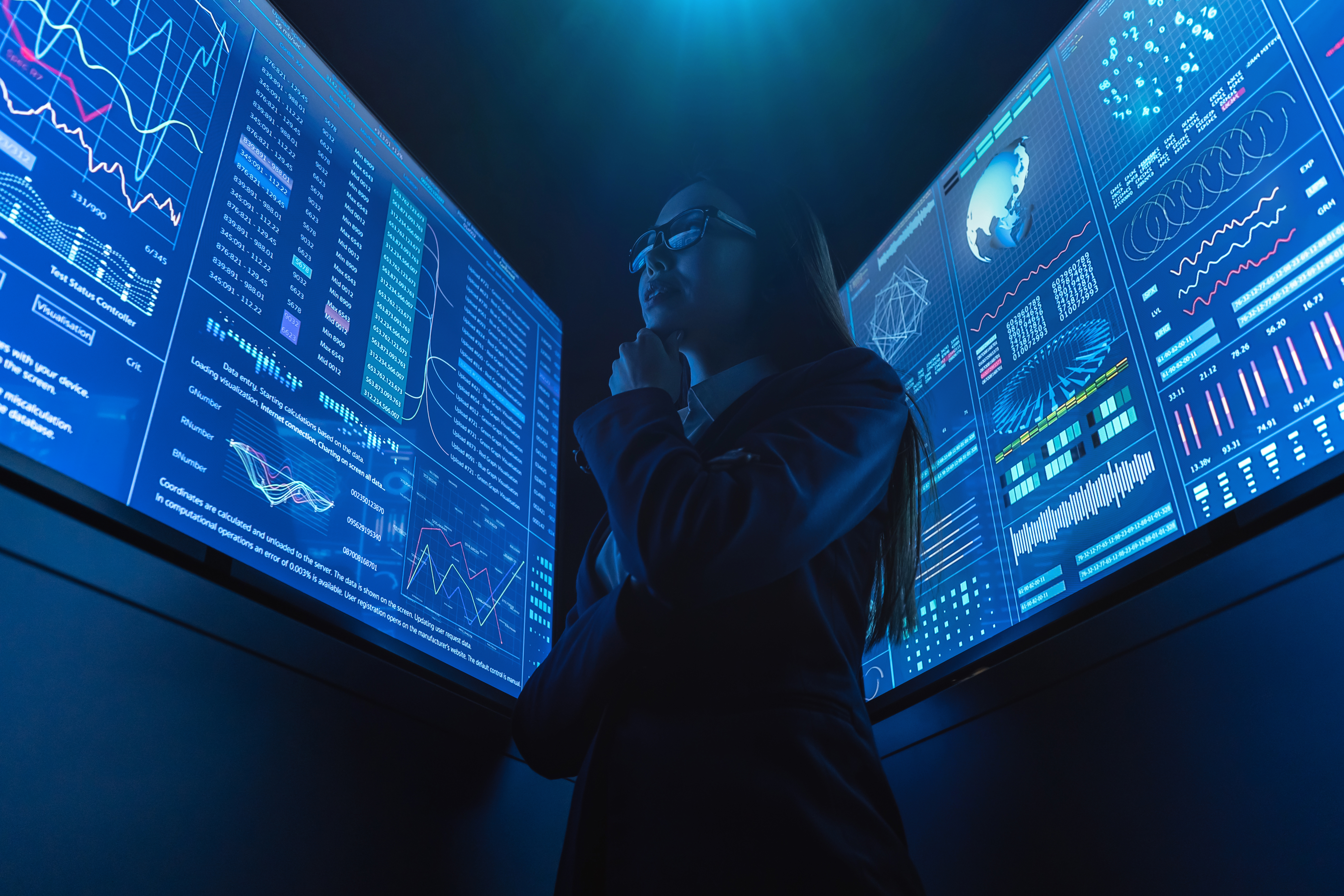 woman-analyzing-data-on-large-computer-screens-2026-09-21-06-15-28-utc.jpg
